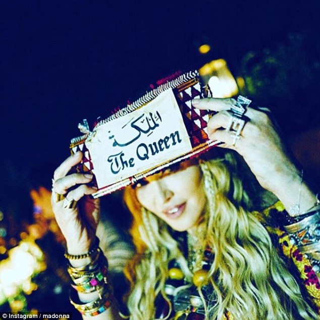 The Queen:Â Madonna used her 60th birthday on Thursday as an opportunity to remind her followers of her status, sharing a fun snap as she held up a sign bearing the words 'The Queen'
