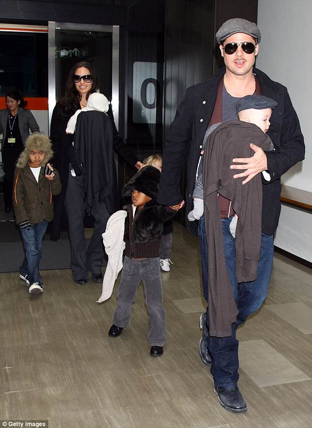 Negotiations: Jolie and Pitt (pictured in 2009) were ordered to go through the summer schedule over the phone with their children along with two psychologists