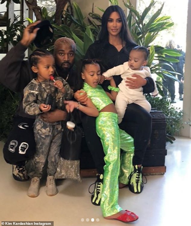 Doting parents: The reality TV iconÂ gave her 122 million Instagram followers a glimpse this Tuesday of the 'Tarzan themed party' she threw her middle child